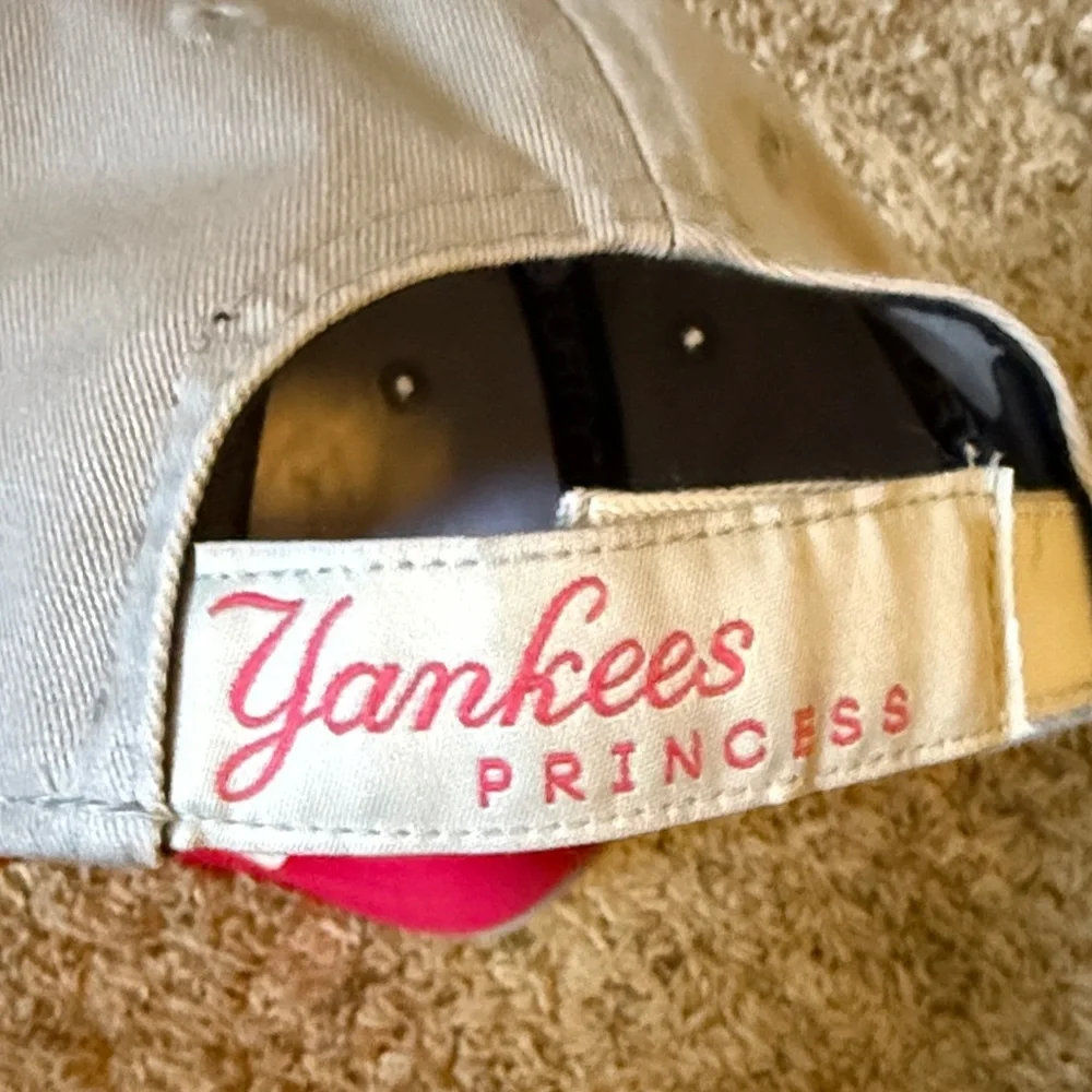 New Era Beige Cap with Unicorn Embroidery purchased at Yankee Stadium